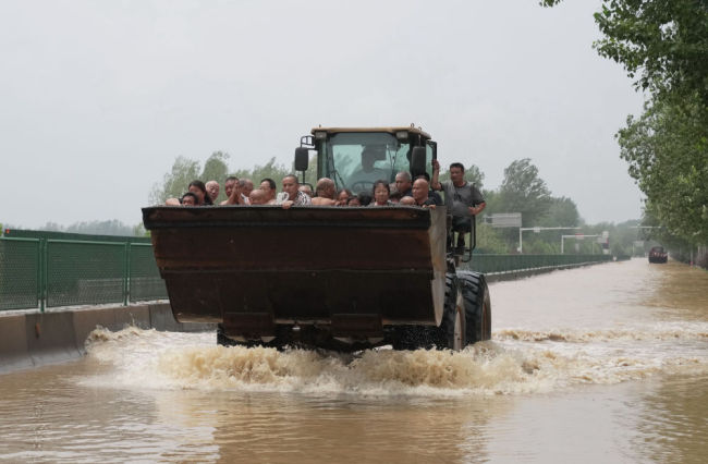 華北、黃(huang)淮等地(dì)抗擊汛(xun)情一線(xian)直擊